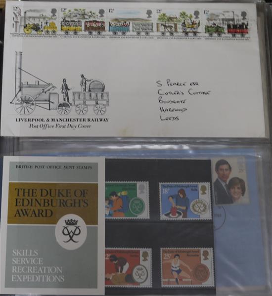 Two stamp albums and First Day covers